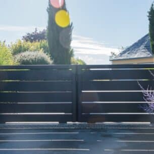 portail coulissant 2 vantaux alu